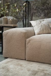 Light corner sofa with hemmed ribbed fabric